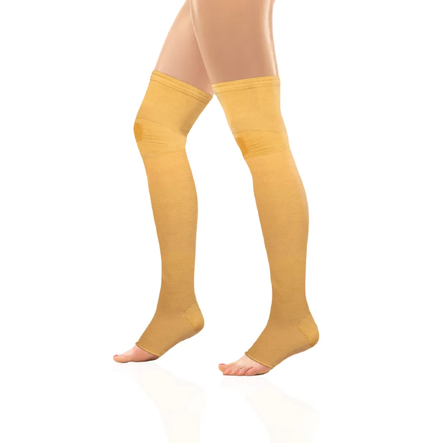 Vissco above-knee compression stocking in beige, worn to the thigh, open toe